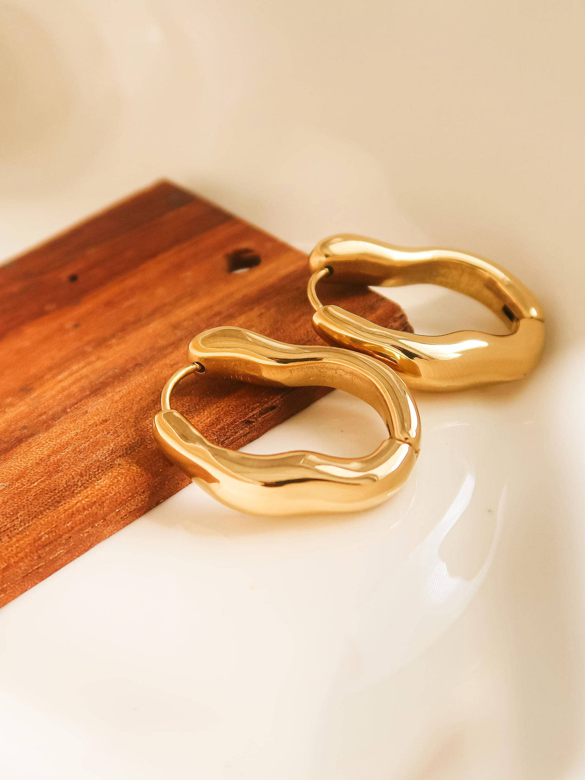 Gold Wave Oval Hoop Earring
